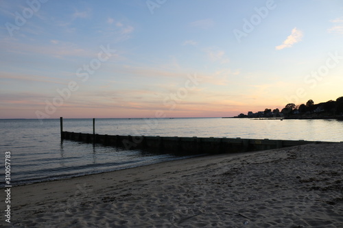 Beautiful New England coastal beach summer sunset