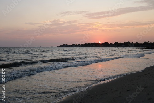 Beautiful New England coastal beach summer sunset