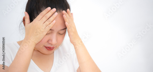 Picture of a girl with severe headache The handle on her head, health problems, stress, medical conditions or rest, a rest in a white background