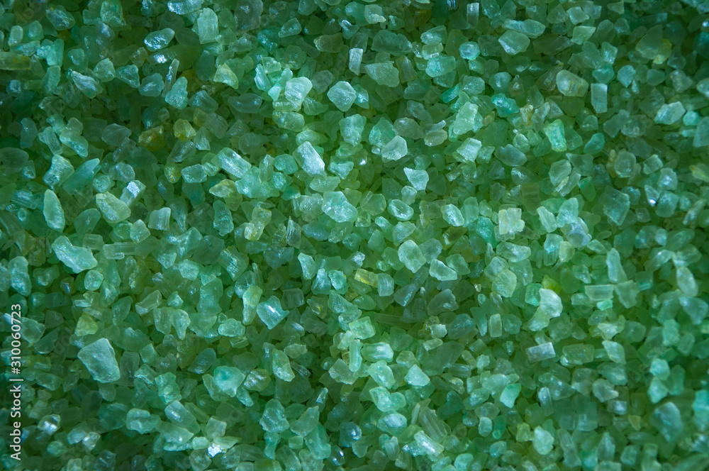 Green bath salt texture background. Top view.