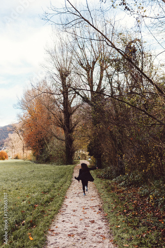 Lady running on a path in the countryside