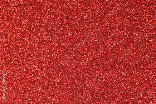 Bright festive background with red sparkles. Party time.