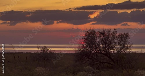 Sunset over Tuzly Lagoons, National Park, Ukraine photo