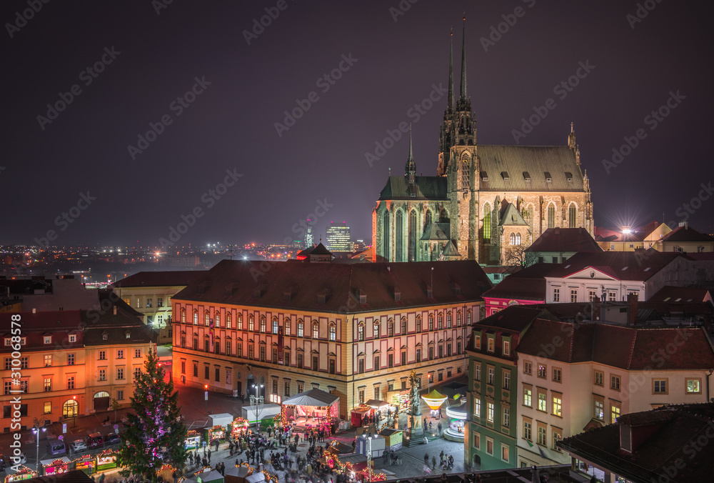 Old Town with Christmas Market and Cathedral of St. Peter and Paul in Brno, Czech Republic as Seen from City Hall Tower at Night