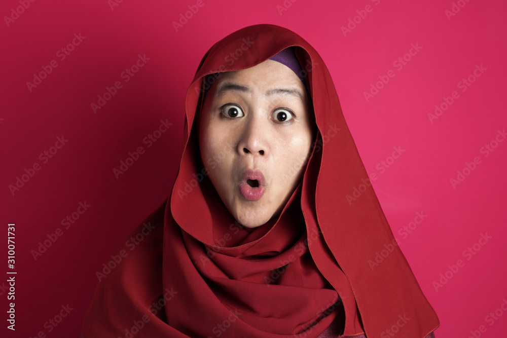 Cute Muslim Lady Shows Shocked Surprised Face with Open Mouth Cute Muslim Lady Shows Shocked Surprised Face with Open Mouth