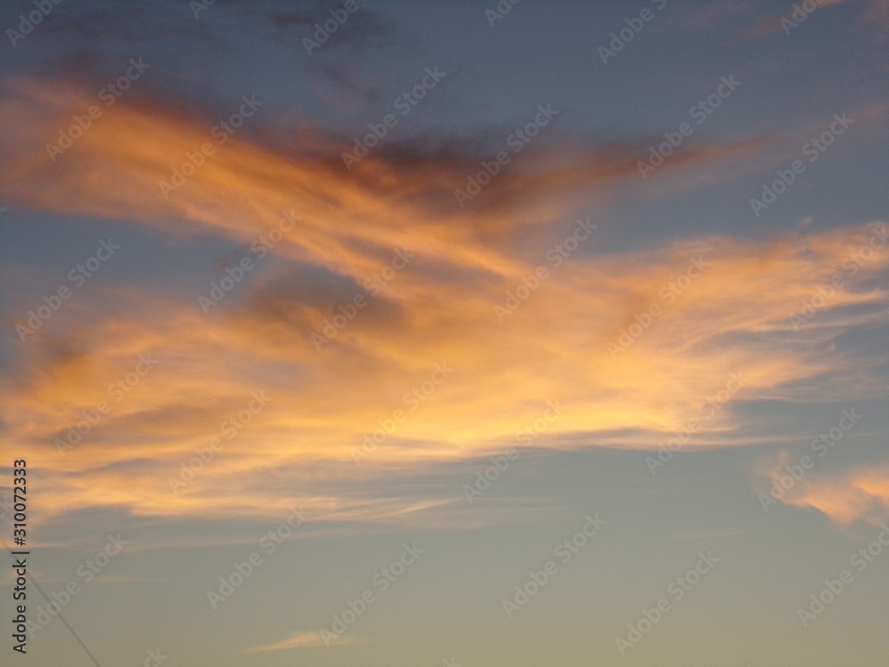 Orange clouds with a blue sky