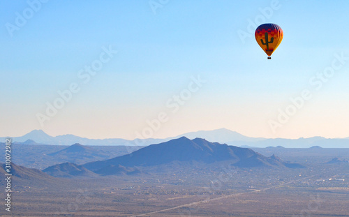 Hot Air Balloon floating over the Misty Mountains of the Arizona Desert near Phoenix © Mary Baratto