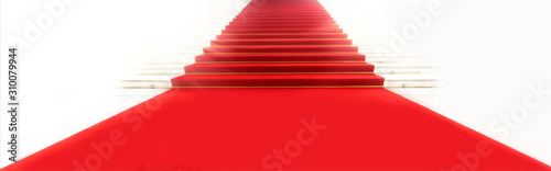 Fotografia Staircase with red carpet, illuminated by light