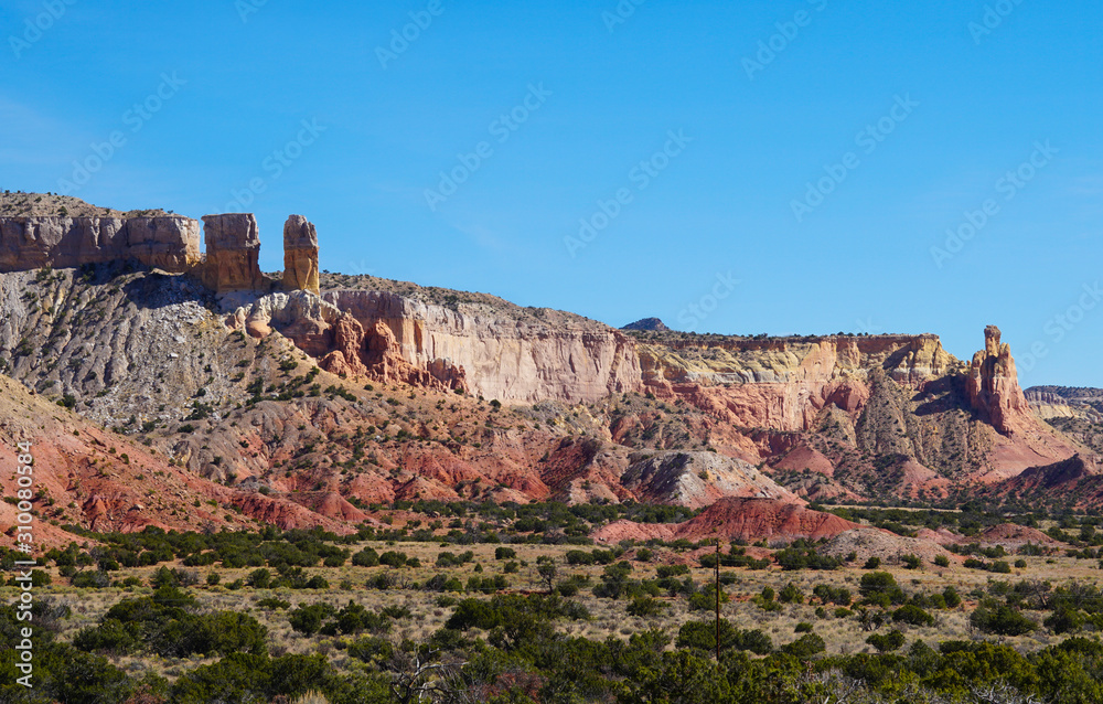 The unusually beautiful mountains surrounding Abiquiu, New Mexico is even more stunning with autumn colors.