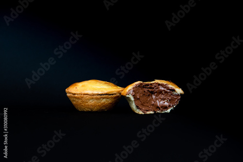 chocolate pie on black background, chocolate pie, brazilian snacks, black background, patty, pie