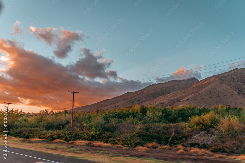 sunset over road in the desert hawai maui sundown - obrazy, fototapety, plakaty 