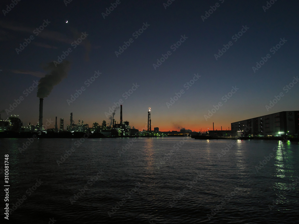 Kanagawa,Japan-December 1, 2019: Flare stack observed from canal in Tokyo at night. 