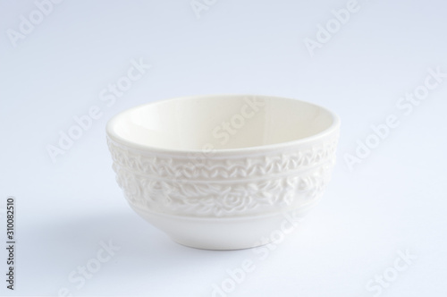 A white cup placed on white background
