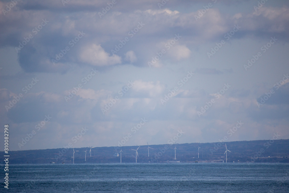 対岸の風力発電 wind the opposite shore, Japan Stock Photo Adobe Stock