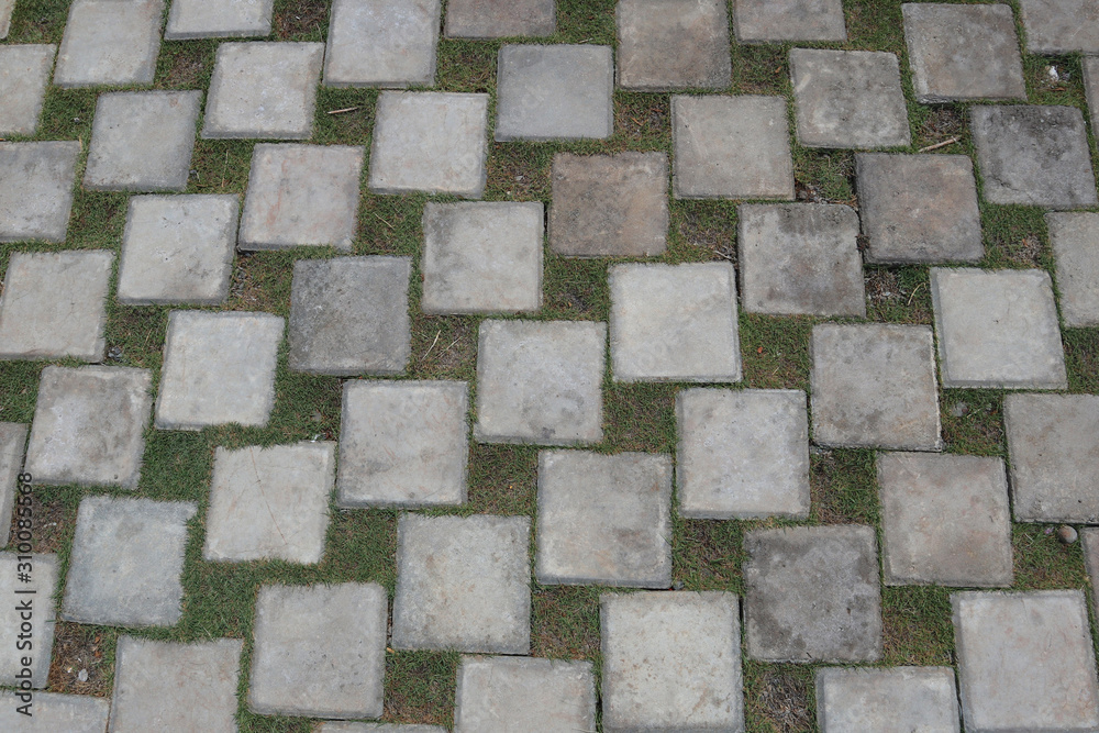 Stone paving green grass pathway Stone paving green grass pathway