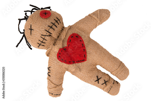 Fotografiet Voodoo doll with in burlap fabric, isolated on white background