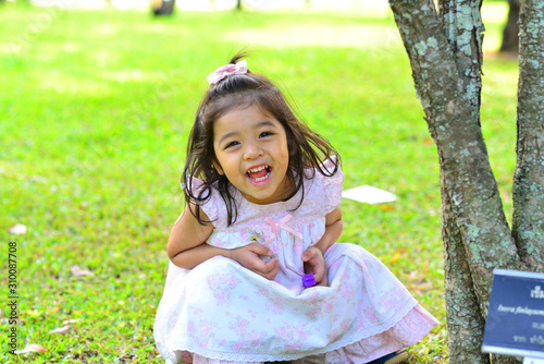 Beautiful Portrait of Little Child Girl Mixed Race Thai Russia Pakistan at Sireeruckhachati Nature Learning Park Nakhon Pathom Thailand