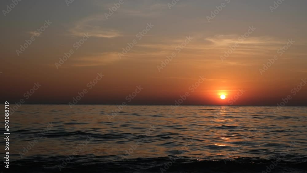 Wide angle video, ocean waves, evening time, sunset of the island. Nature concept And tourism Wide angle video, ocean waves, evening time, sunset of the island. Nature concept And tourism