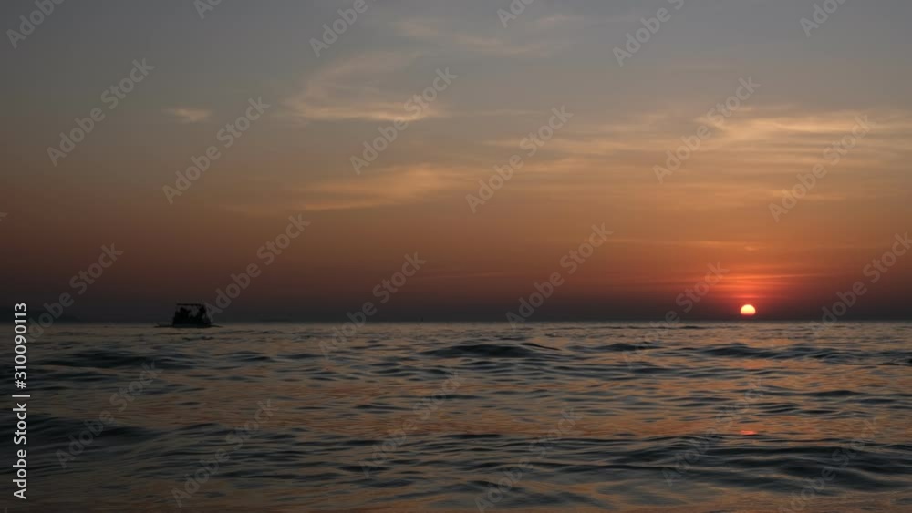 Wide angle video, ocean waves, evening time, sunset of the island. Nature concept And tourism Wide angle video, ocean waves, evening time, sunset of the island. Nature concept And tourism
