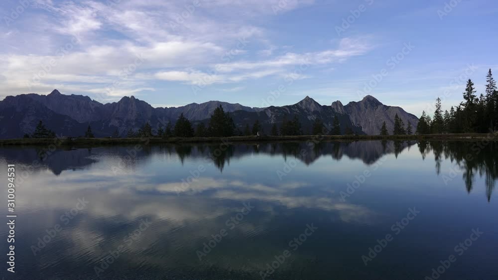 Perfect mountain lake with reflections in the alps. Kaltwassersee lake near Seefeld in Tirol, Austria Perfect mountain lake with reflections in the alps. Kaltwassersee lake near Seefeld in Tirol, Austria