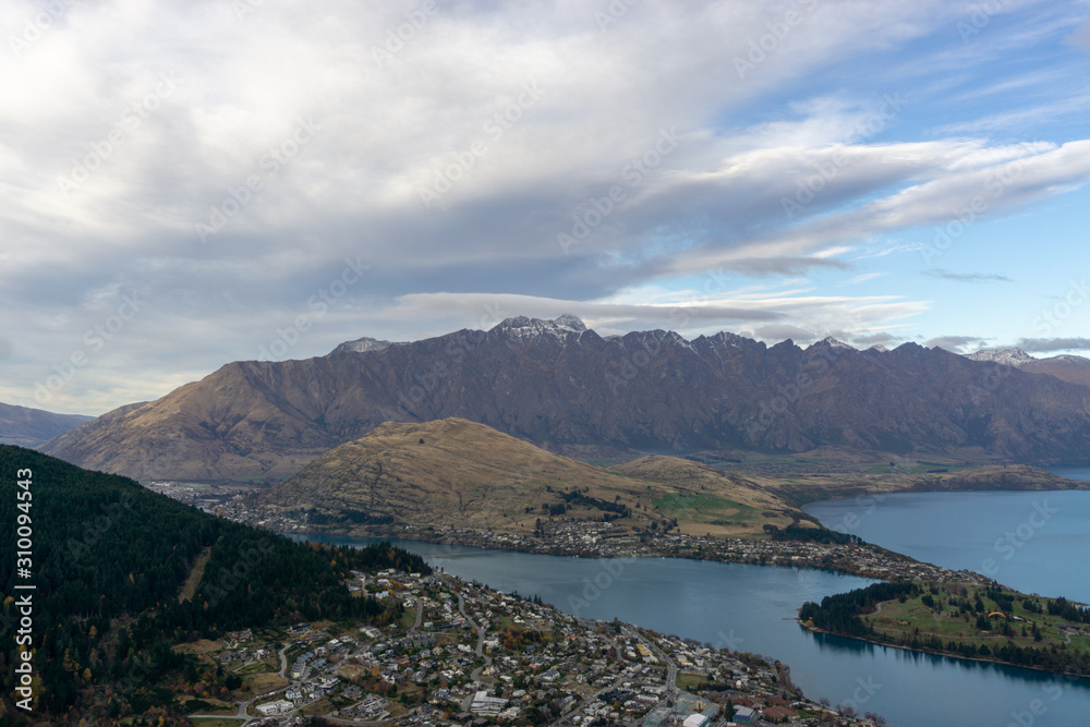 Looking down at Queenstown with beautiful lake from top of Ben Lomond mountain