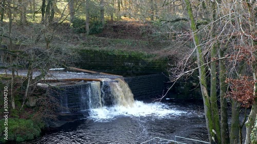 Abbeystead Weir Waterfall Flowing into the River Wyre from the Resevoir Near the Forest of Bowland photo