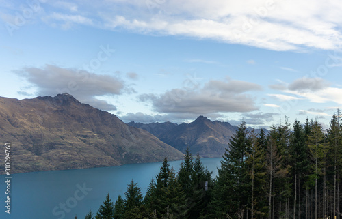 Looking down at Queenstown with beautiful lake from top of Ben Lomond mountain