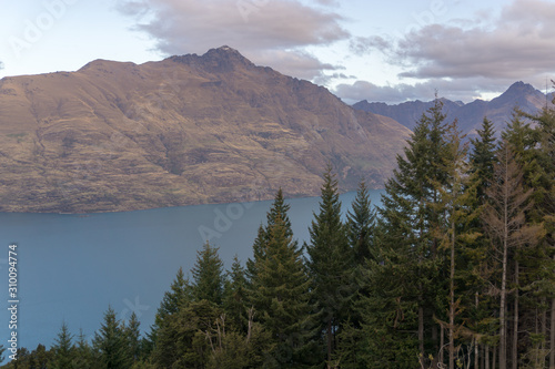 Looking down at Queenstown with beautiful lake from top of Ben Lomond mountain