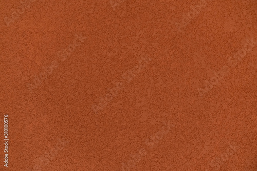 Seamless deep orange stucco material in high resolution / background texture / interior material