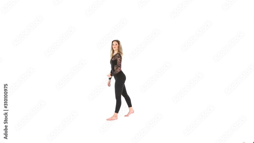 Young female ballet dancer leaping on a white background Young female ballet dancer leaping on a white background