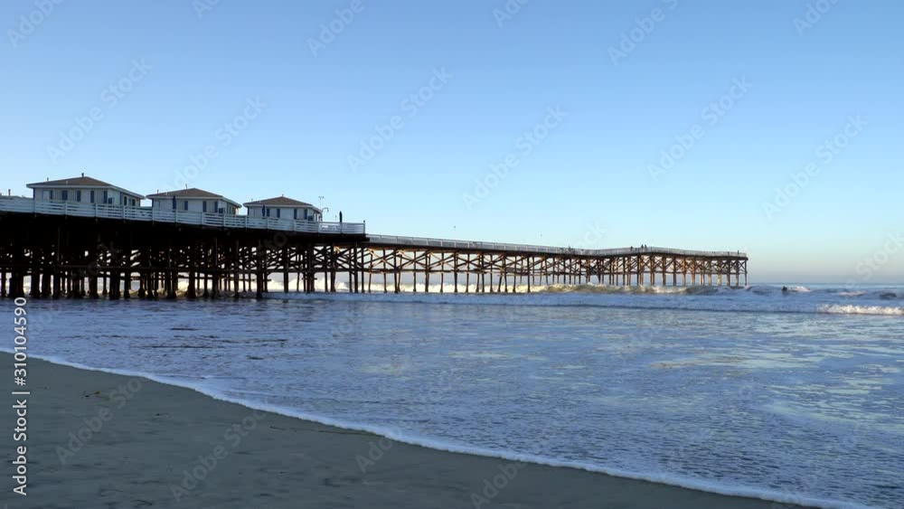 Ocean Waves hitting the legs of the Crystal Beach Pier, San Diego, California Ocean Waves hitting the legs of the Crystal Beach Pier, San Diego, California