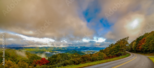early morning autumn foggy photo at blue ridge parkway north carolina