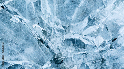 Broken ice on the lake. Pieces of ice close up. Pieces of ice in nature. Chunks of cracked ice closeup. photo