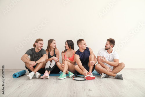 Group of sporty friends nea...