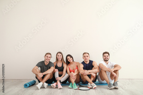 Group of sporty friends nea...