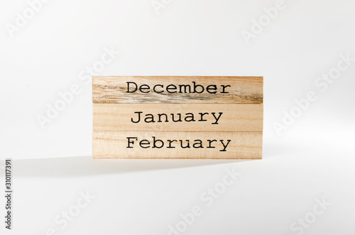 winter month wooden blocks isolated