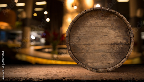 background of barrel and worn old table of wood © kishivan