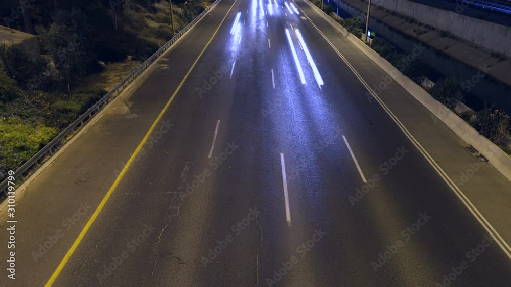 Night road highway of urban traffic. Trail effect Long exposure Time Lapse . Concept urban motion Night road highway of urban traffic. Trail effect Long exposure Time Lapse . Concept urban motion