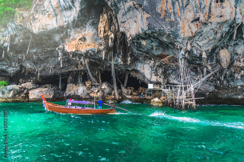 Landscape of Viking cave with longtail boat for traveler Phi Phi island Krabi, Famous landmark tourist travel Phuket Thailand summer holiday vacation trips, Tourism beautiful destinations place Asia