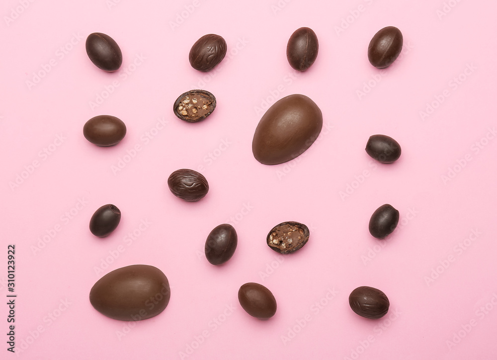 Chocolate Easter eggs on color background Chocolate Easter eggs on color background