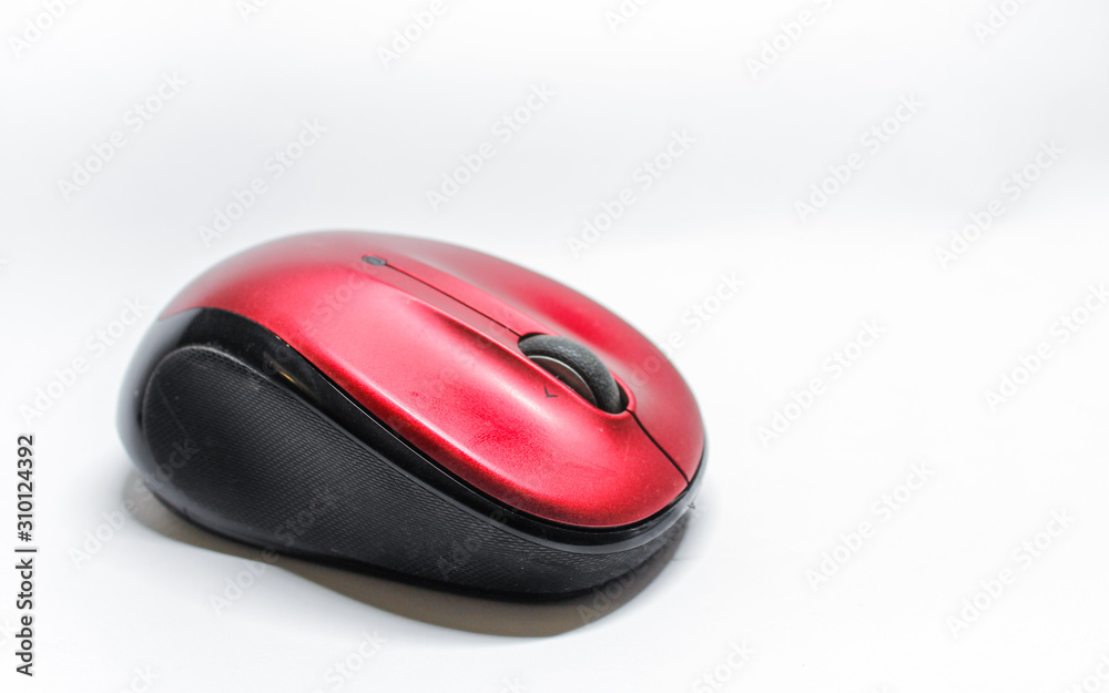 Modern red computer mouse on a white background Modern red computer mouse on a white background
