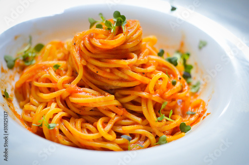 delicious italian spaghetti with tomatoes sauce