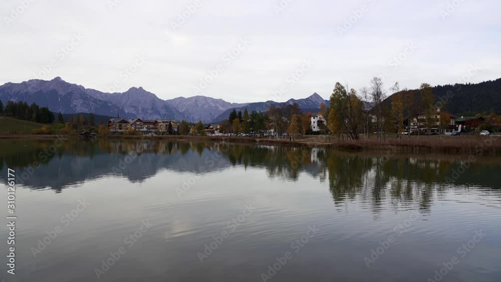 Perfect lake in the alps in autumn reflecting mountain background. Wildsee, Seefeld in Tirol, Austria Perfect lake in the alps in autumn reflecting mountain background. Wildsee, Seefeld in Tirol, Austria