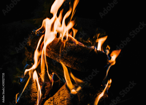Logs on fire © Hunter