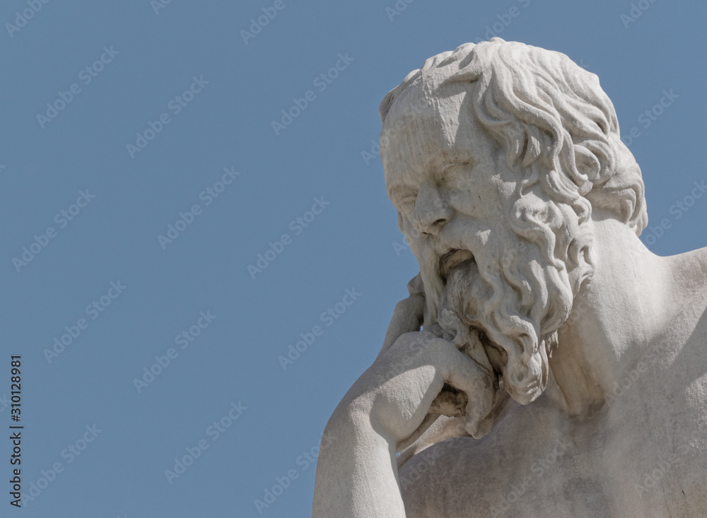 Socrates the ancient greek philosopher marble portrait isolated on blue sky background