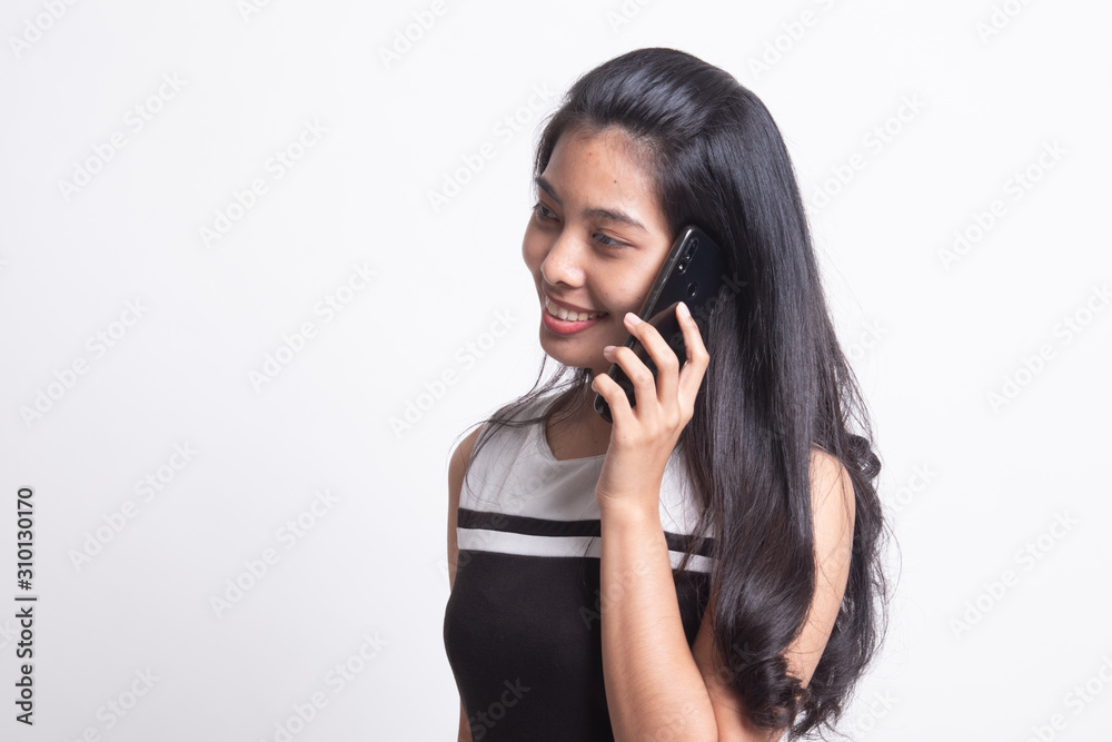 Young Asian woman talking with mobile phone Young Asian woman talking with mobile phone
