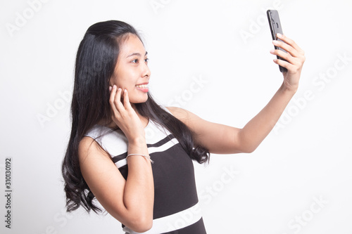 Young Asian woman selfie with mobile phone