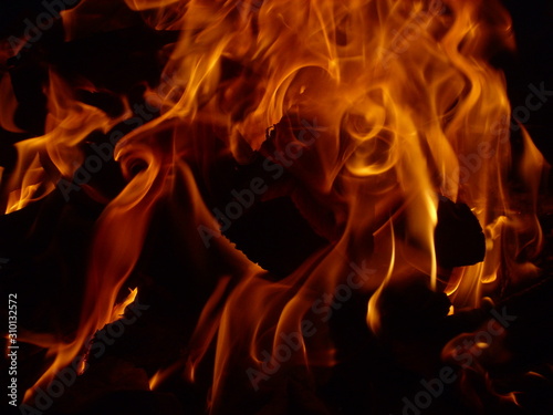 close up photo of bonfire, background of red and black colors