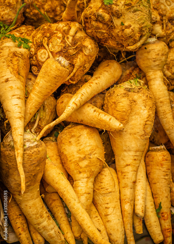 Fresh parsley and celery root on sale in the Machane Yehuda outdoor market