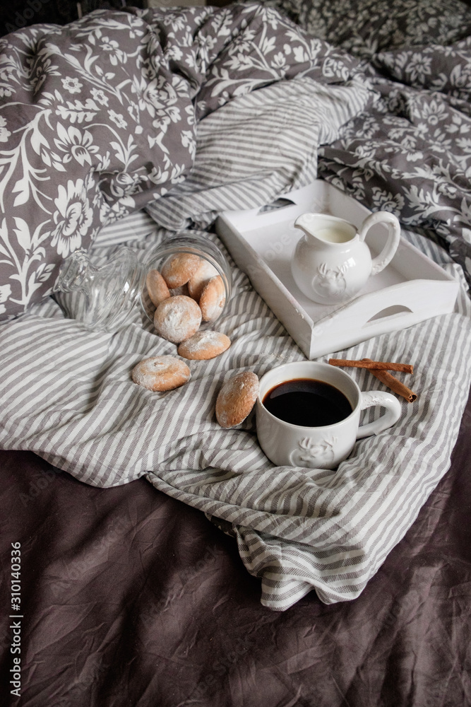 coffee with cookies in bed. Interior details. Gray background. Beautiful flat lay coffee with cookies in bed. Interior details. Gray background. Beautiful flat lay